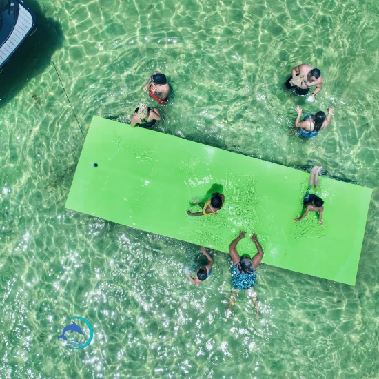 people at crab island on a mat